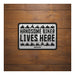 Oxford Garage Metal Sign: Handsome Biker Lives Here